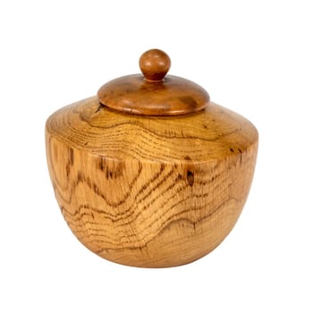 Side view of a turned oak wood jar with lid isolated on white