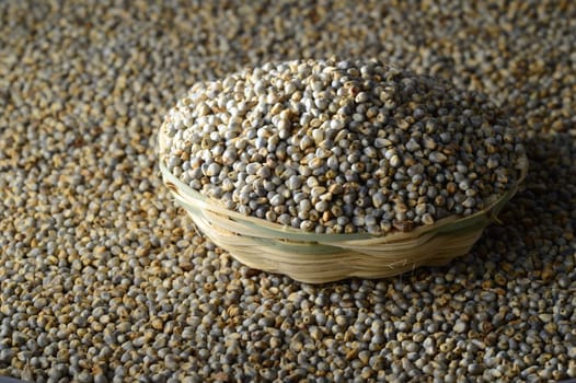 Bajra (Pearl millet) in wooden (bamboo) basket