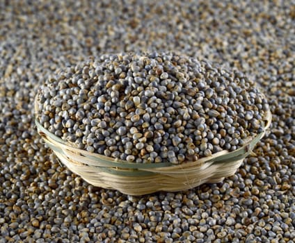 Bajra (Pearl millet) in wooden (bamboo) basket