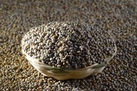 Bajra (Pearl millet) in wooden (bamboo) basket