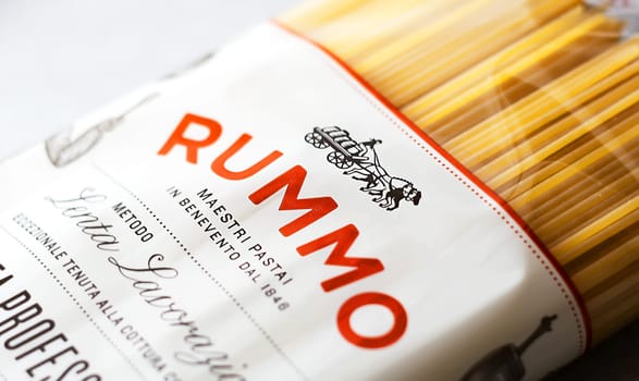 Rome, Italy, November 15th 2020: the Rummo logo printed on the transparent package of spaghetti pasta. Famous Italian brand in the pasta market. Illustrative editorial