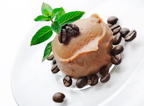 .Ice cream decorated with fresh mint and coffee beans
