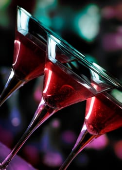Martini glasses in front of the night lights