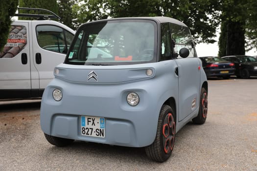 Seillans, France - June 19, 2021: French Small Citroen Ami Electric Two-Seater Micro-City Car Parked In The Street Of Seillans In The South Of France, Europe. Close Up Front View .