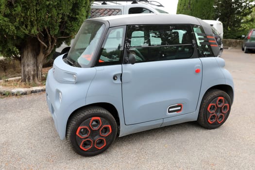 Seillans, France - June 19, 2021: French Small Citroen Ami Electric Two-Seater Micro-City Car Parked In The Street Of Seillans In The South Of France, Europe. Close Up Side View .