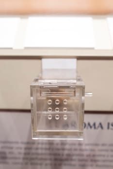 Museum display of methacrylate box with fragance. Specialized equipment for scents exhibitions