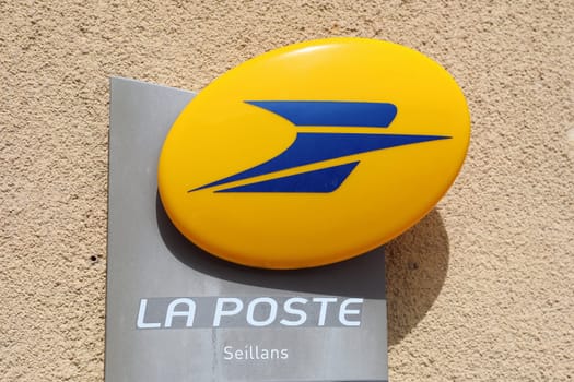 Seillans, France - June 19, 2021: La Poste Yellow Logo Sign, French Post Brand, Shop In The Street Of Seillans In The South Of France, Europe. Close Up View
