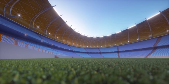 Soccer field in the sports stadium. Lawn illuminated in the center by the surrounding lights.