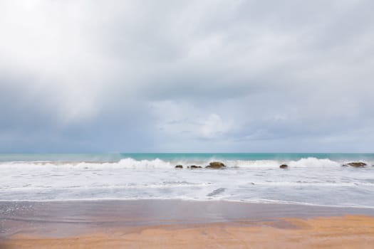 Empty beach and wave of the sea in Brittany, France