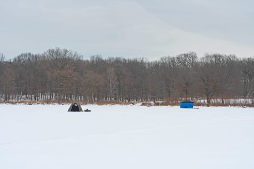 Ice Fishing Tents on a Frozen Lake in the Ned Brown Preserve in Illinois