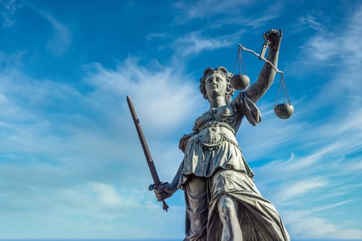Justitia monument in Frankfurt roemerberg low angle