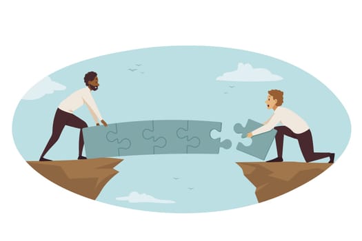 Partnership, connection, business concept. Team of african american businessmen managers partners assembling jugsaw puzzles building bridge together. Teamwork cooperation and coworking collaboration.