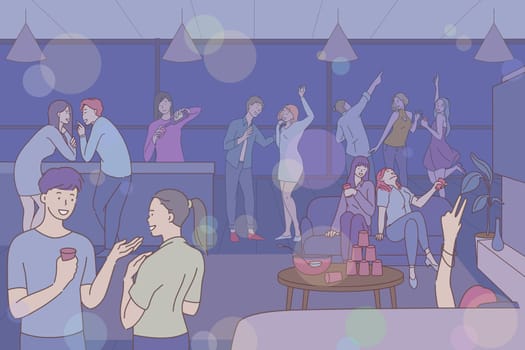People listen music at holiday party. Young men and women dance, have great musical house evening. Boys and girls spend leisure time having fun at parties. Partying at holidays is part of student life