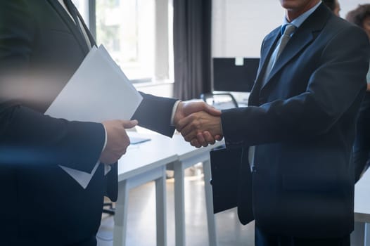 Two Unrecognizable Business Man Shake Hand Agreement Coworking Center Business Team Coworkers In Modern Office
