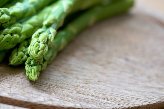 fresh green asparagus from an asparagus field as an ingredient in a kitchen