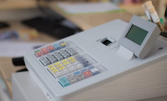 Cash register in a shop: Customer is paying purchase