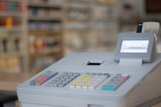 Cash register in a shop: Customer is paying purchase