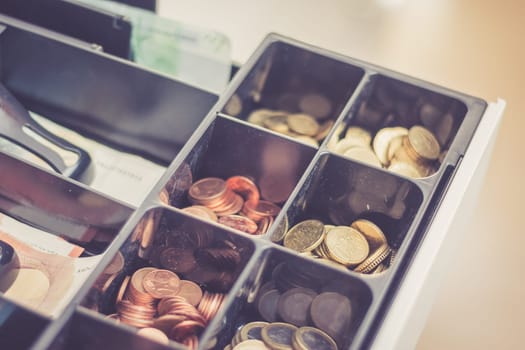 Cash register in a shop: Customer is paying purchase
