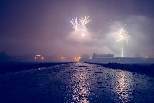 Firework at new year on a dusty wet landscape, Austria