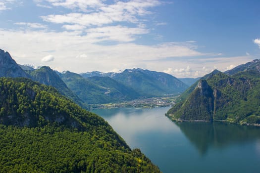 Traunsee lake with alps mountain and city Traunkirchen from hill Kleiner Schonberg. Austria landscape. Upper Austria, Austria