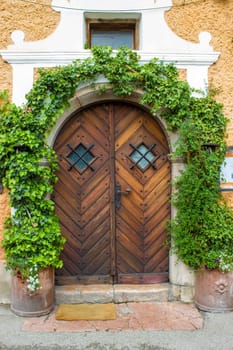 Old vintage wooden door in Hallstatt in Austria