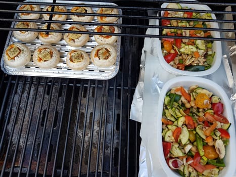 Grilled vegetables on a barbecue grill in a white bowl, top view