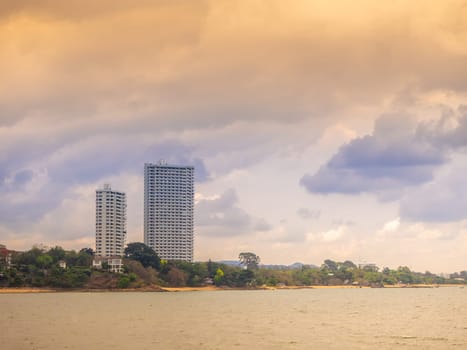 high  Building in Pattaya  Beach  and beautiful blue sea.