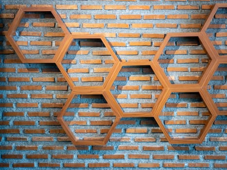 Shelves made of hexagonal wood on vintage wall