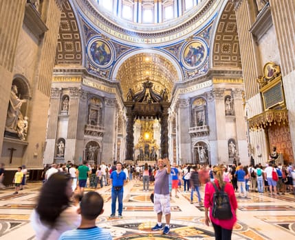 ROME, VATICAN STATE - August 24, 2018: interior of Saint Peter Basilica with mass-tourism arrival