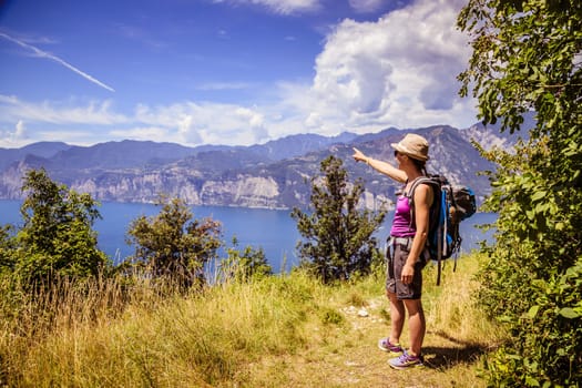 Young girl is hiking on Monte Baldo, Italy