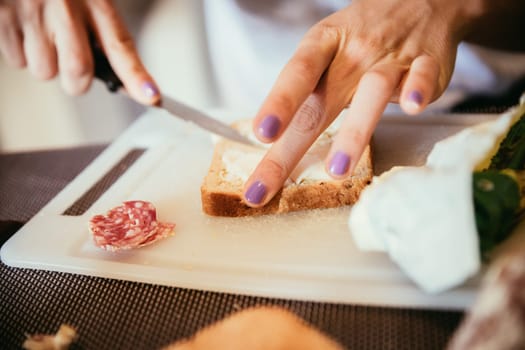 Preparing snack for children: table with cutting board