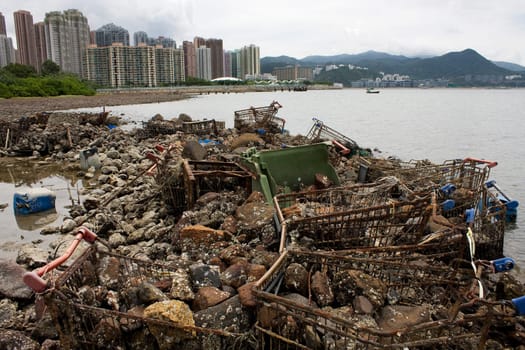 Garbage piled up on the coast of the ocean