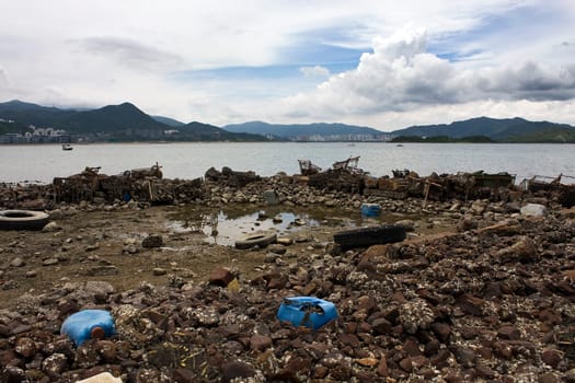 Garbage piled up on the coast of the ocean