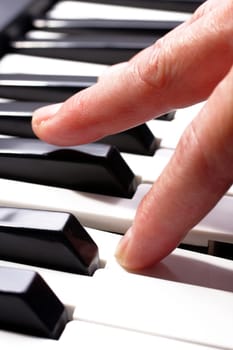 hands playing music on the piano, hands and piano player, keyboard .