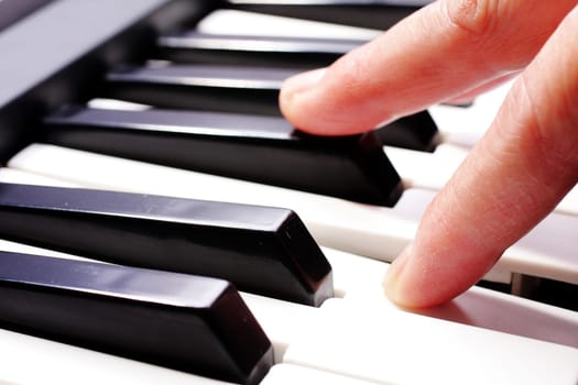 hands playing music on the piano, hands and piano player, keyboard .