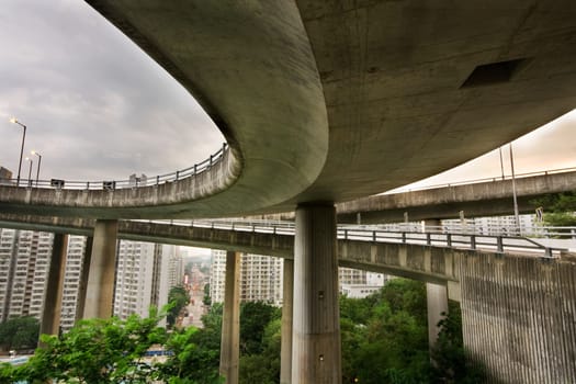 Modern Urban City with Freeway Traffic bridge at day, hong kong