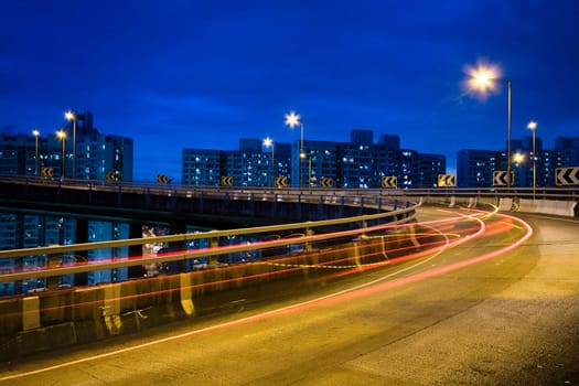 traffic bridge at night in hong kong.