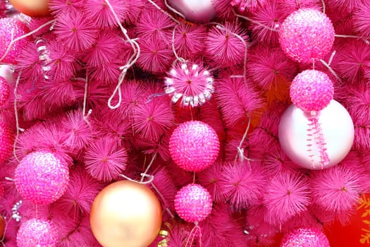 pink christmas background with many balls