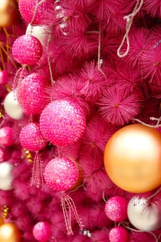 pink christmas background with many balls