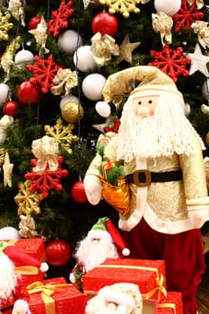 Santa Claus with gifts close up