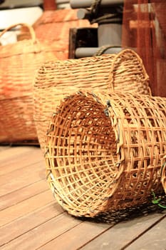 many yellow Wicker Basket  on the floor