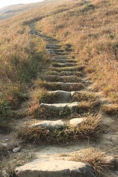path through mountains ,stone step close up