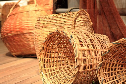 many yellow Wicker Basket  on the floor