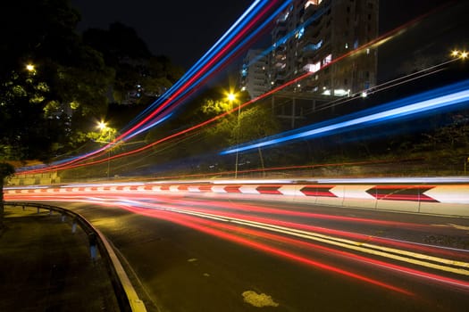 traffic in city at night in hong kong