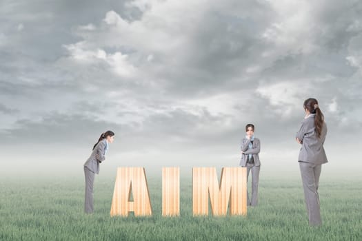Concept of focus, point, center etc with 3d wooden text and businesswoman under copyspace sky. The Asian woman is the same one.