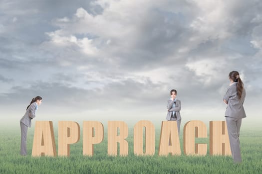 Concept of strategy, plan, idea etc with 3d wooden text and businesswoman under copyspace sky. The Asian woman is the same one.