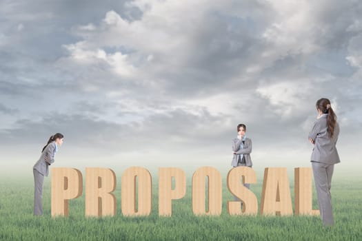 Concept of strategy, plan, idea etc with 3d wooden text and businesswoman under copyspace sky. The Asian woman is the same one.