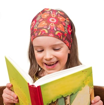 Child reads a book