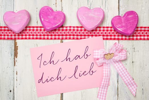 Pink card with the inscription I love you