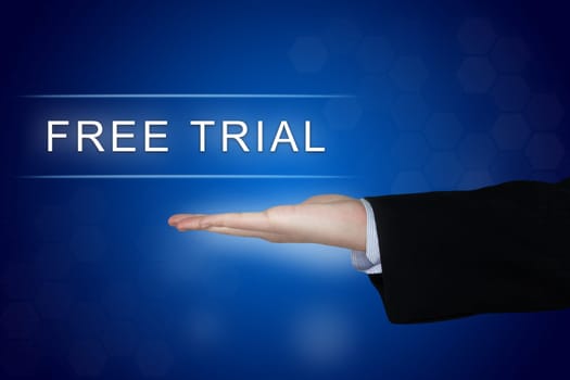 free trial button with business hand on blue background